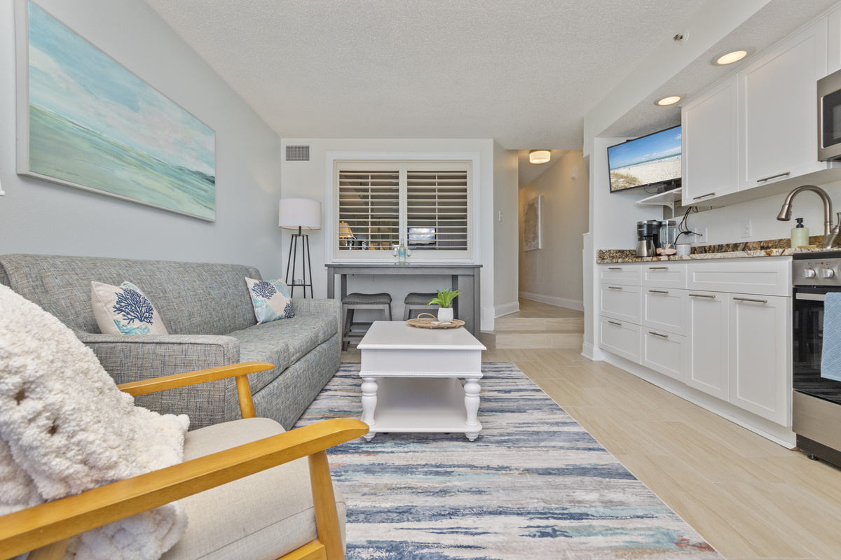 Comfortable and spacious living and dining area with smart TV, work and/or dining table. 