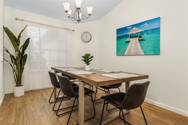 Dining table fits up to 8 people with 2 chairs on each side of the table (2 chairs are not shown in this photo--see previous picture).  2 additional seating spots at the kitchen island.