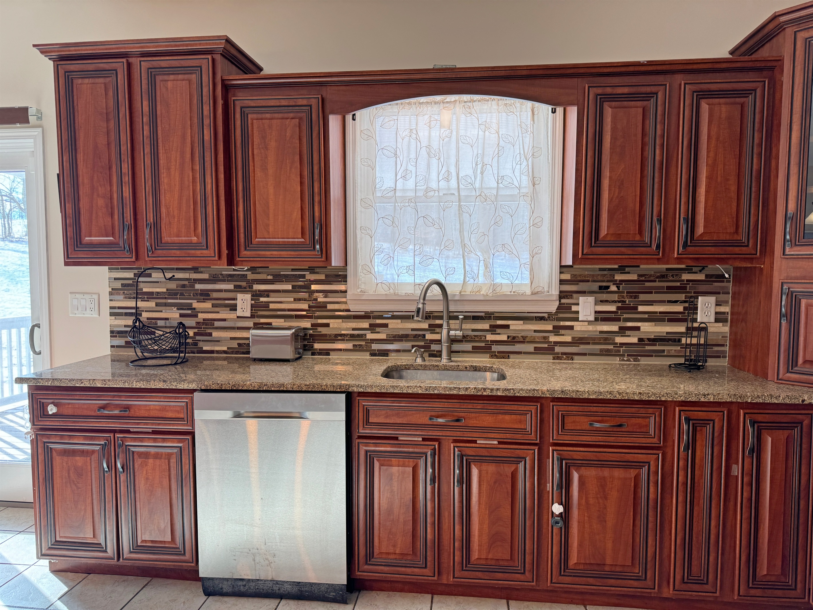 Beautiful cabinetry and stainless appliances in kitchen