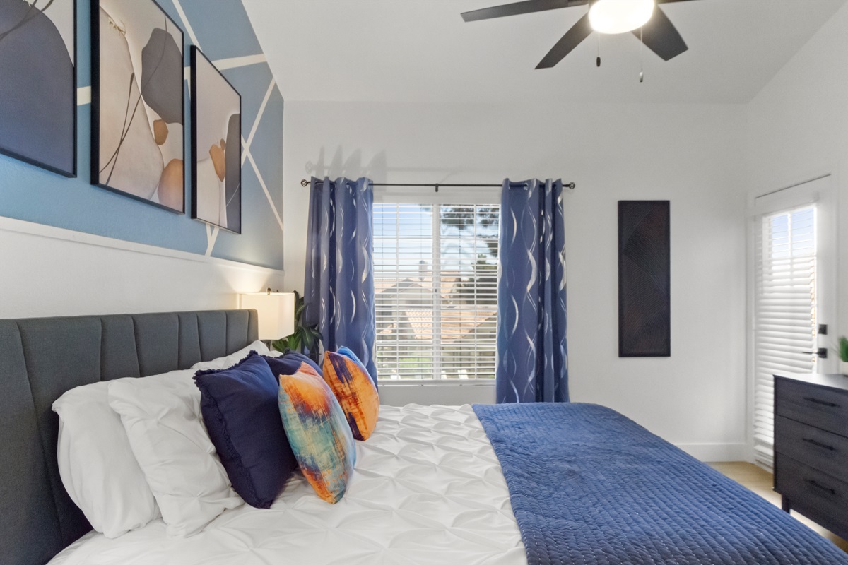 Rest and recharge in a beautifully designed bedroom featuring a comfortable bed with fresh linens, soft pillows, and a calming, hotel-style ambiance.