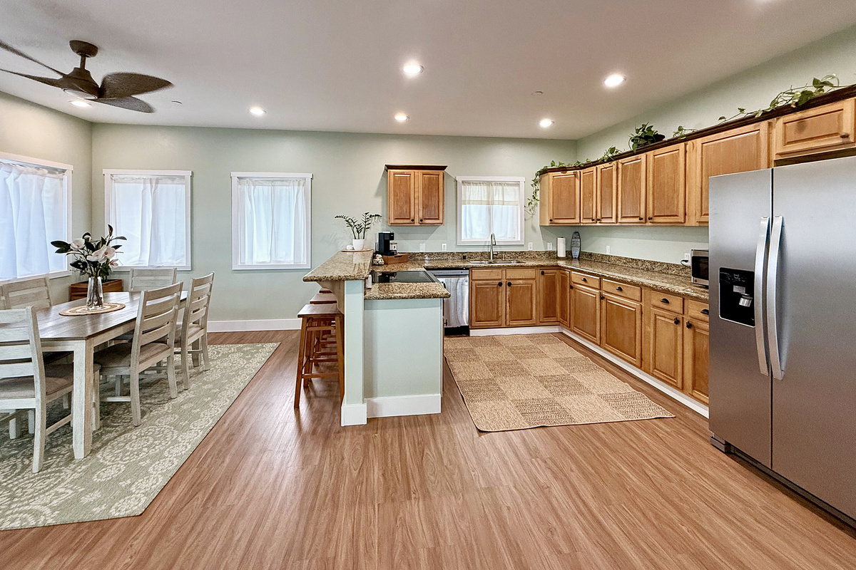Kitchen | Representative Interior. Finishes, decor, and furniture, vary by duplex unit.
