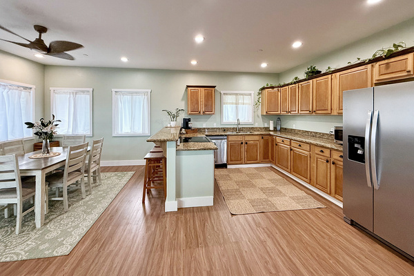 Kitchen | Representative Interior. Finishes, decor, and furniture, vary by duplex unit.
