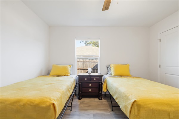 The 4th bedroom has two twin beds and a 43-inch Roku TV. Roku TVs allow you to view your own streaming shows and will log you out automatically when you leave.