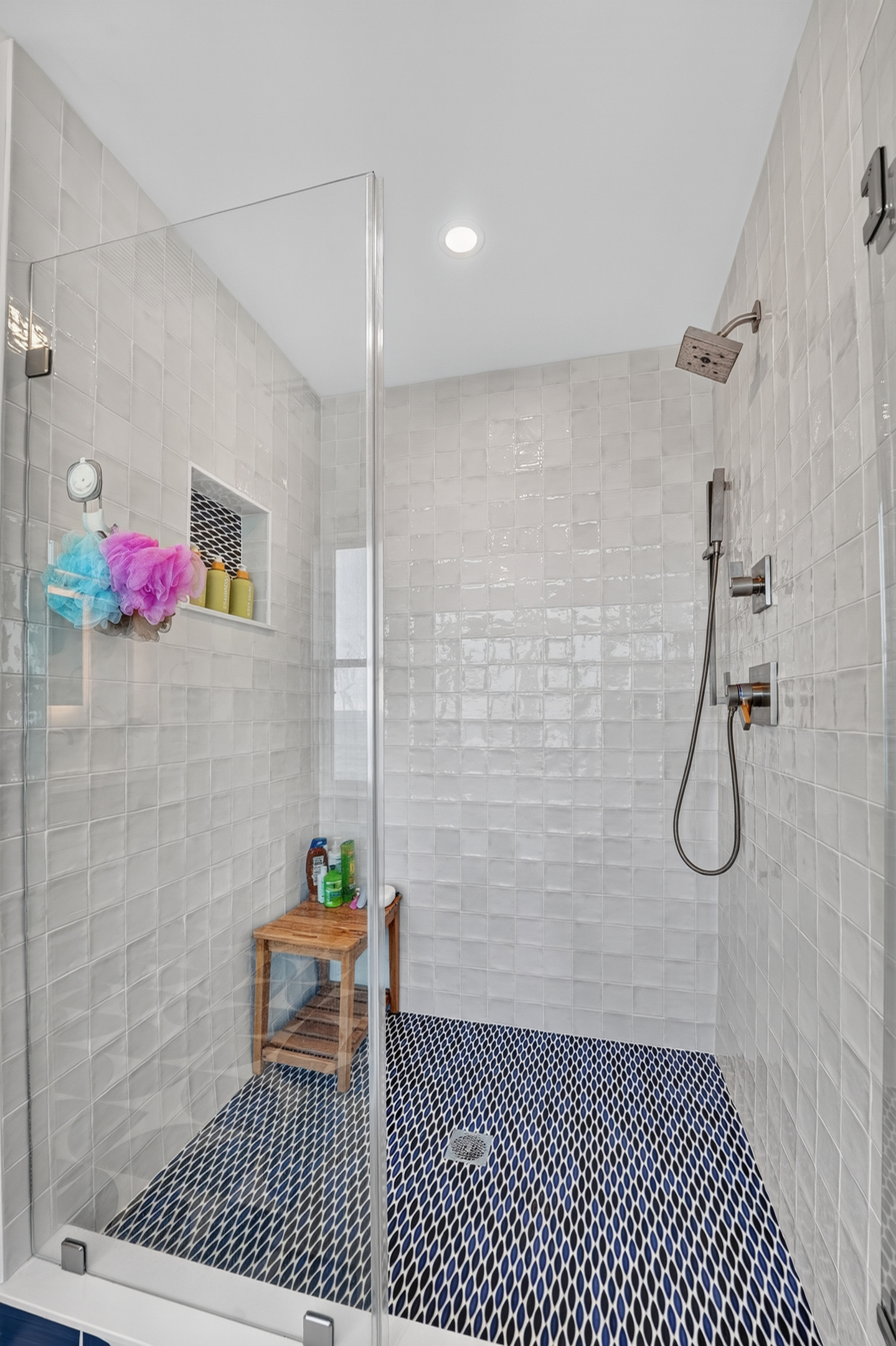 A beautifully designed walk-in shower offers a refreshing start or end to your day.