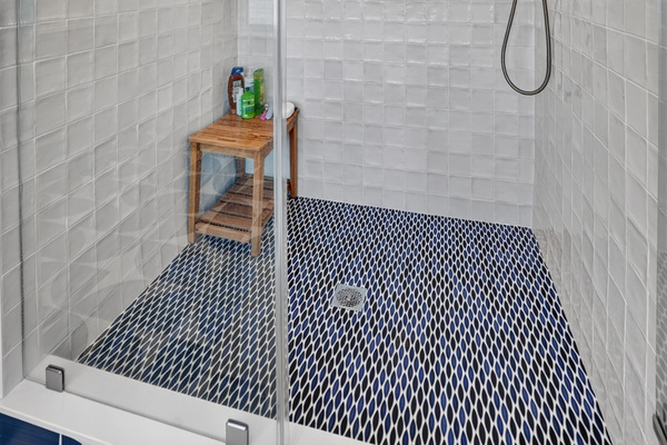 A beautifully designed walk-in shower offers a refreshing start or end to your day.