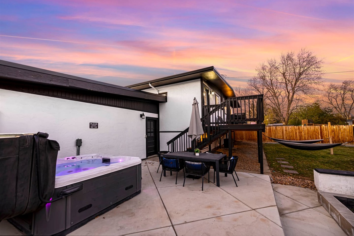 Private hot tub, outdoor dining & fire pit for the ultimate backyard oasis.