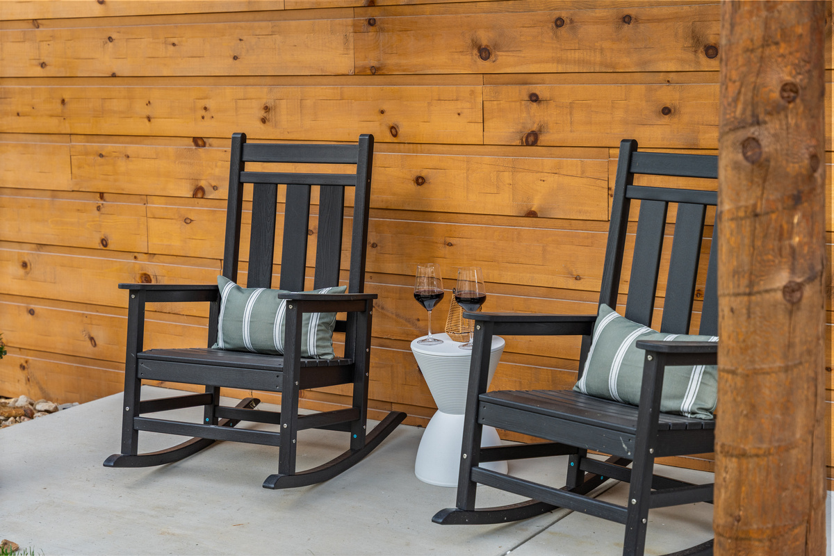 Pour a glass of wine and settle into a porch rocker – mornings and evenings are made for the front porch here.