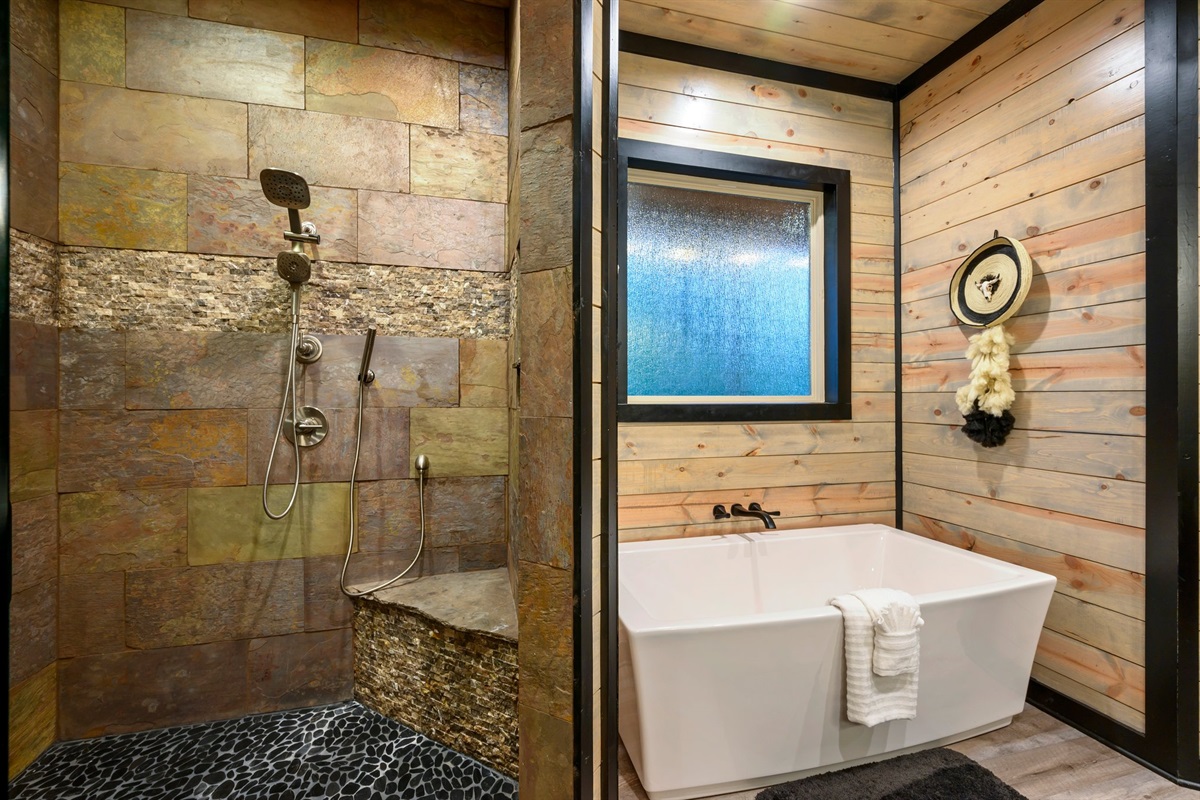 Gorgeous walk-in shower and soaking tub in downstairs King ensuite.