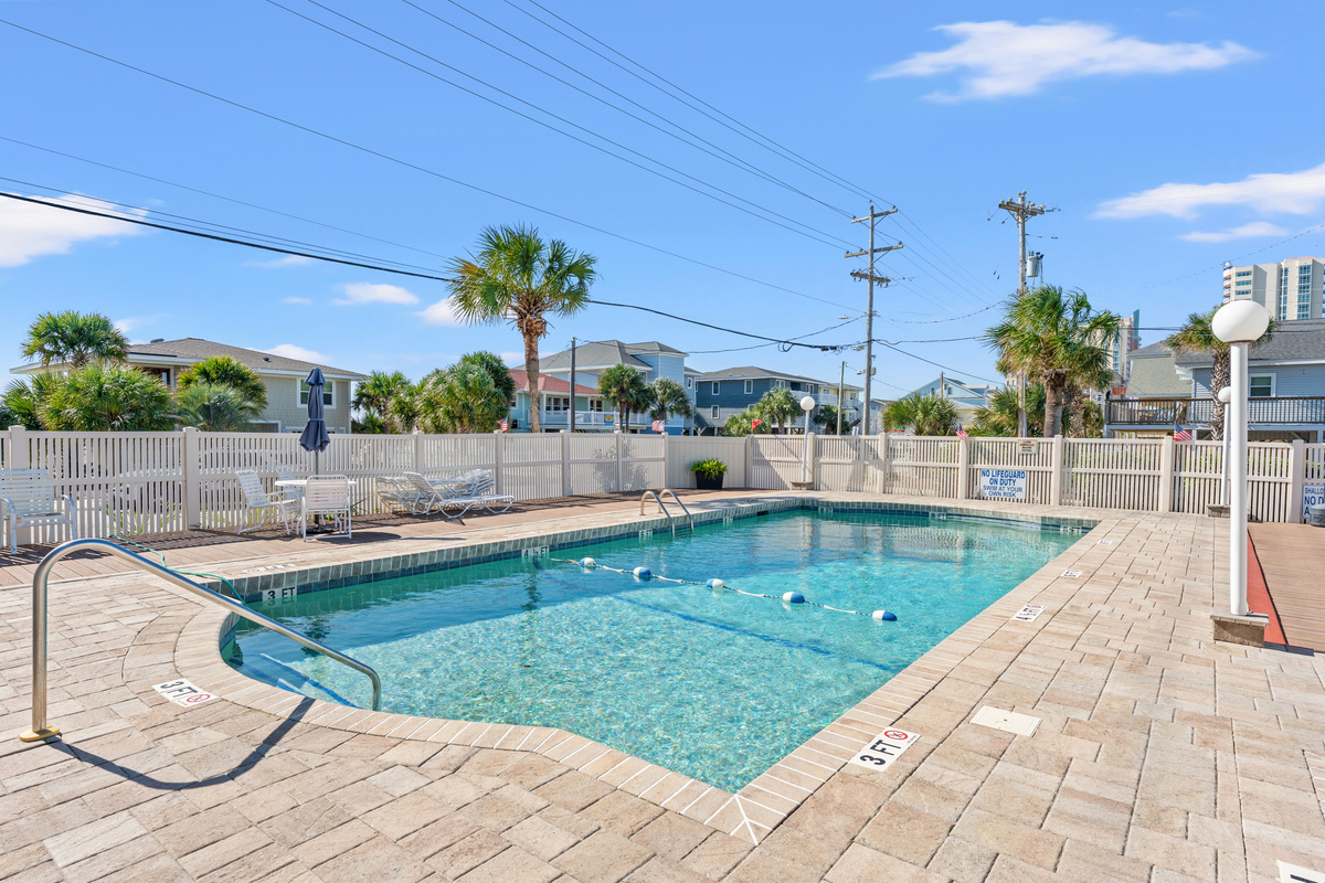 Outdoor pool w/ sun loungers