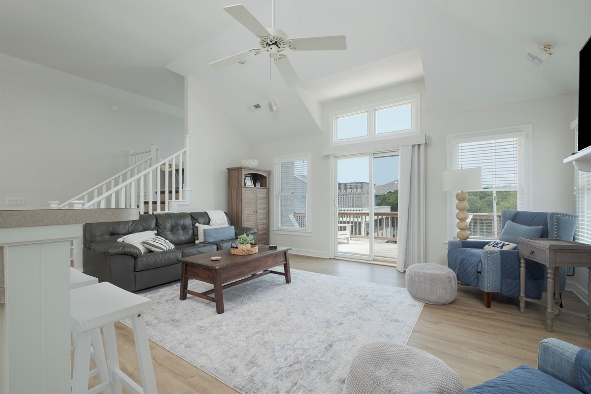 Open-concept living room with plenty of natural light and comfort.