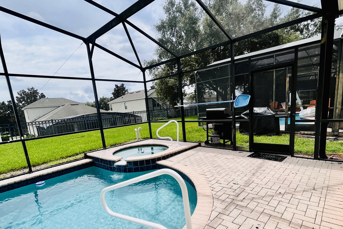 Bbq grill located outside the pool area