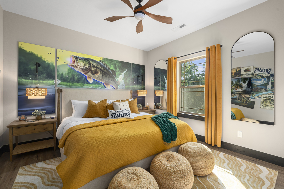 Rise and cast in the Sunrise Fishing Room, a king suite under a leaping-bass mural.