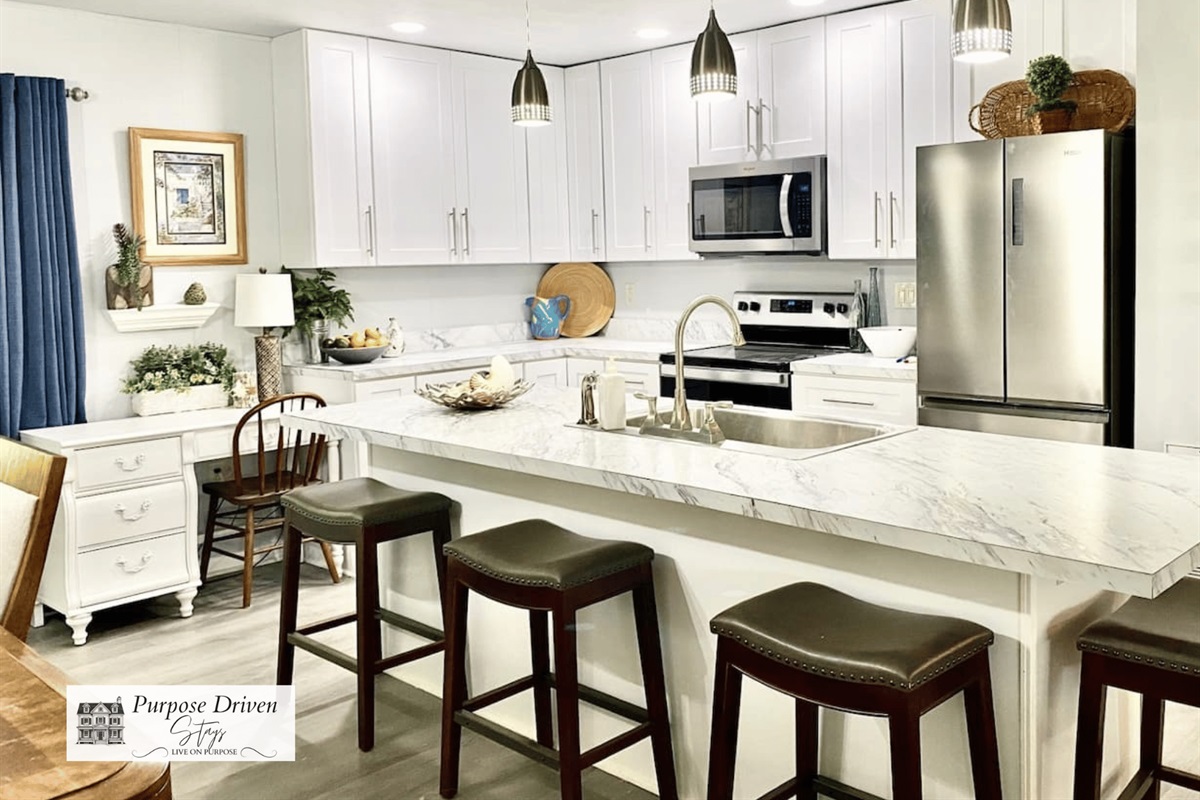 A great open concept updated kitchen to gather with your group and enjoy meals!