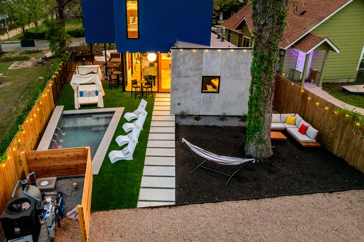 Waterfall pool w/ backyard entertainment