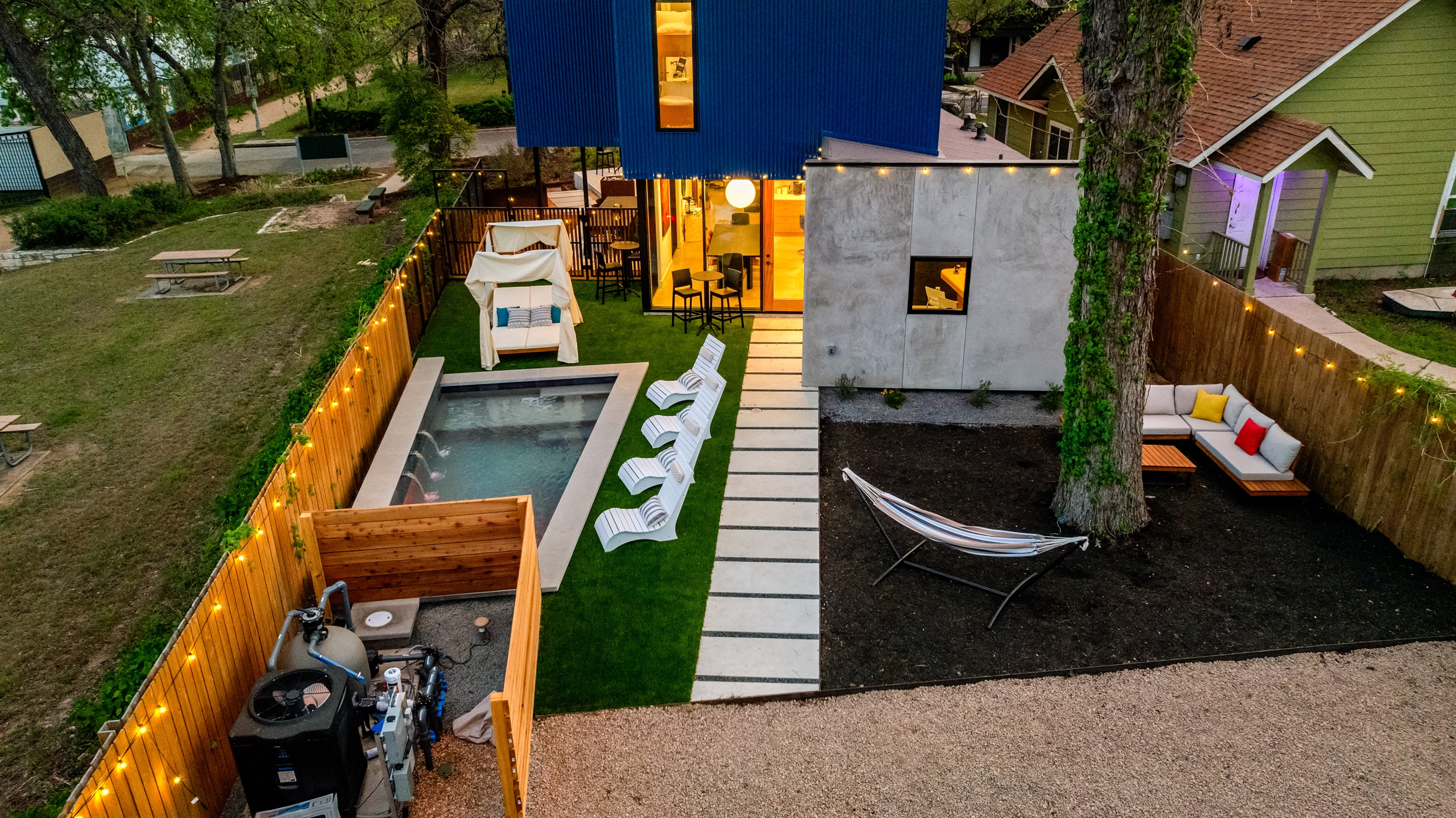 Waterfall pool w/ backyard entertainment