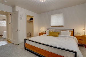 The master suite boasts a king bed that will call you to sleep in a little extra.