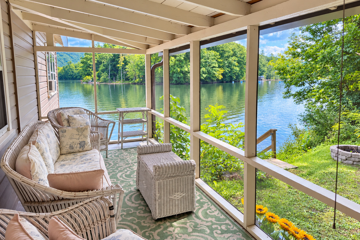 Goodyear Boathouse screened in porch overlooking the water.