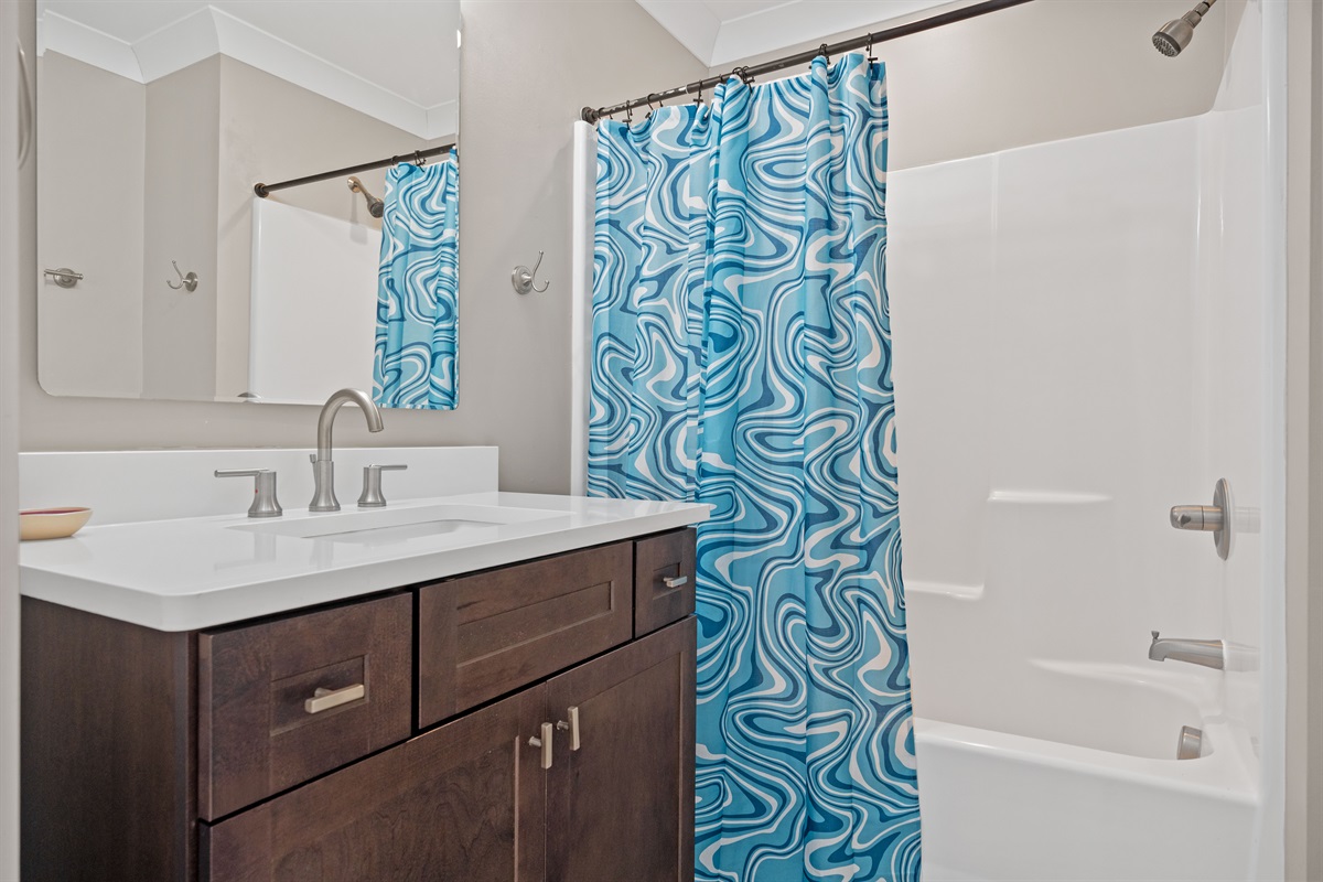 2nd Floor Shared Bathroom &ndash; Conveniently shared between the King and Double Queen bedrooms, featuring a full bath with combo tub/shower and toilet