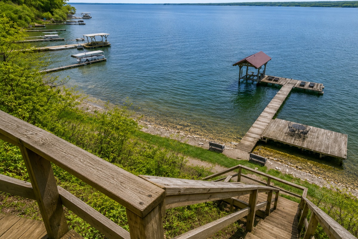 Enjoy panoramic lake views from above as you make your way down to your waterfront escape. Hoist not available
