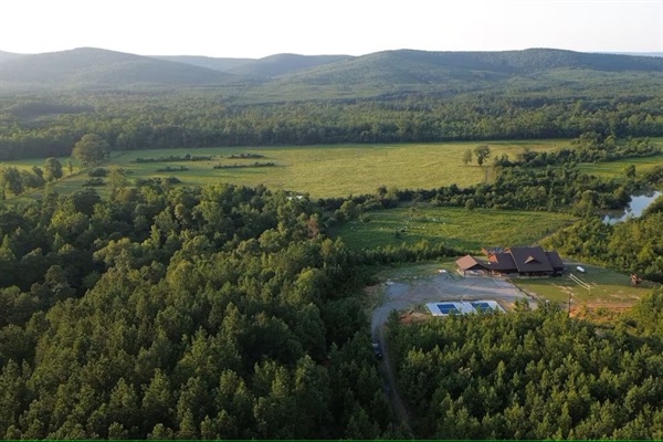 High vantage view of the river valley and distant mountains.
