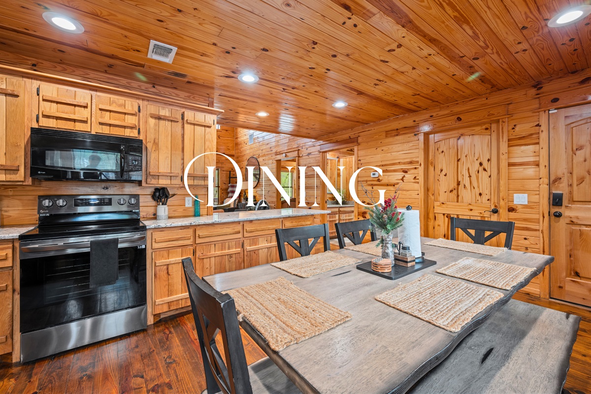 Gathering around the dining table feels natural here, with a comfortable setup that’s perfect for meals, games, or late-night conversations.