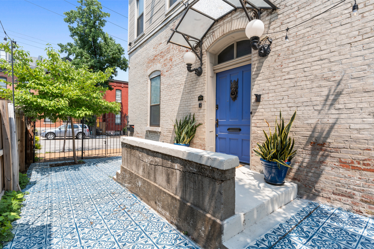 That blue door is your entrance to one seriously unforgettable St. Louis stay.