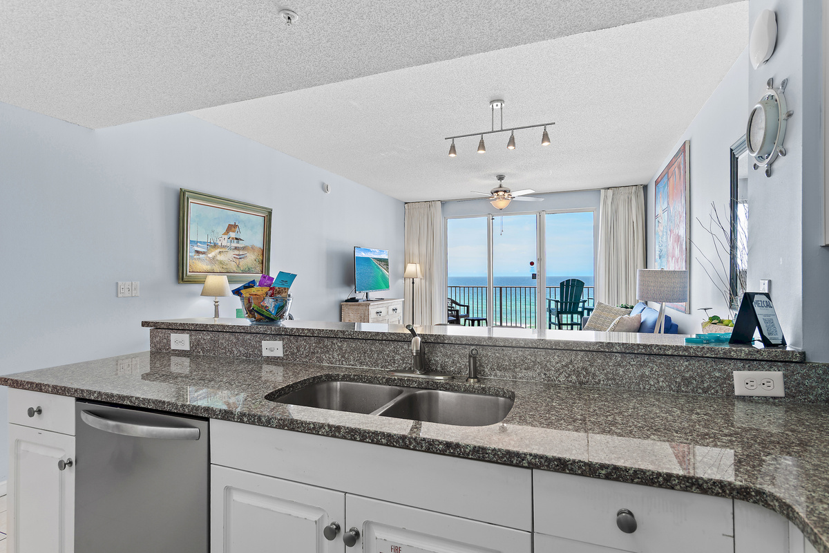 Kitchen has GULF VIEWS, granite countertops, stainless appliances - fully stocked with more than the basics (coffee/tea bar, oils/salt and pepper, plenty of pots/pans/cookware)
