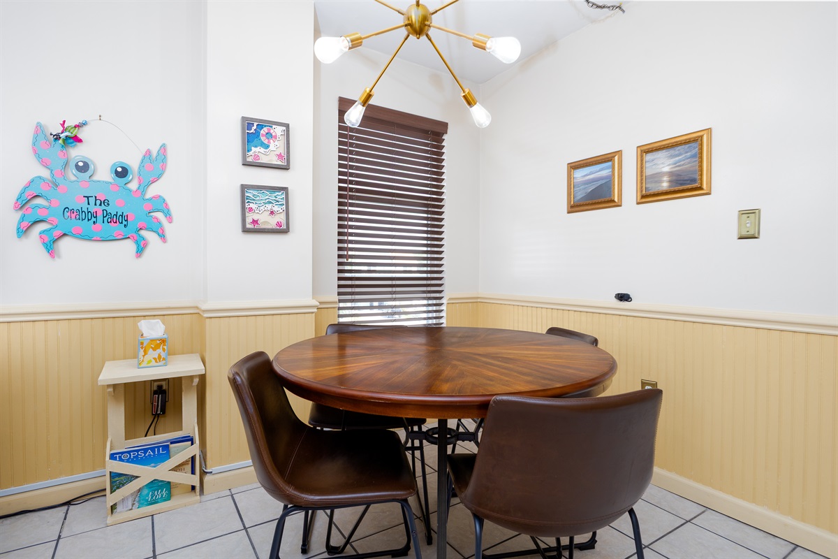 Coastal-themed decor adds a relaxed vibe to the dining area