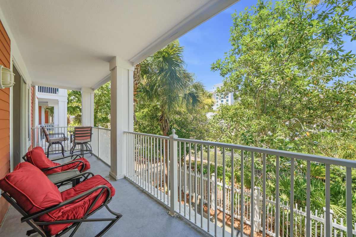 Large 150 sq ft balcony overlooking the pool connects both living & dining room.