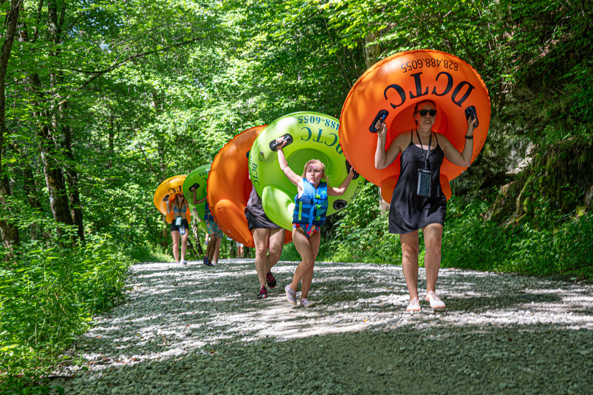 Adventure Awaits: Embark on a tubing journey surrounded by nature's splendor!