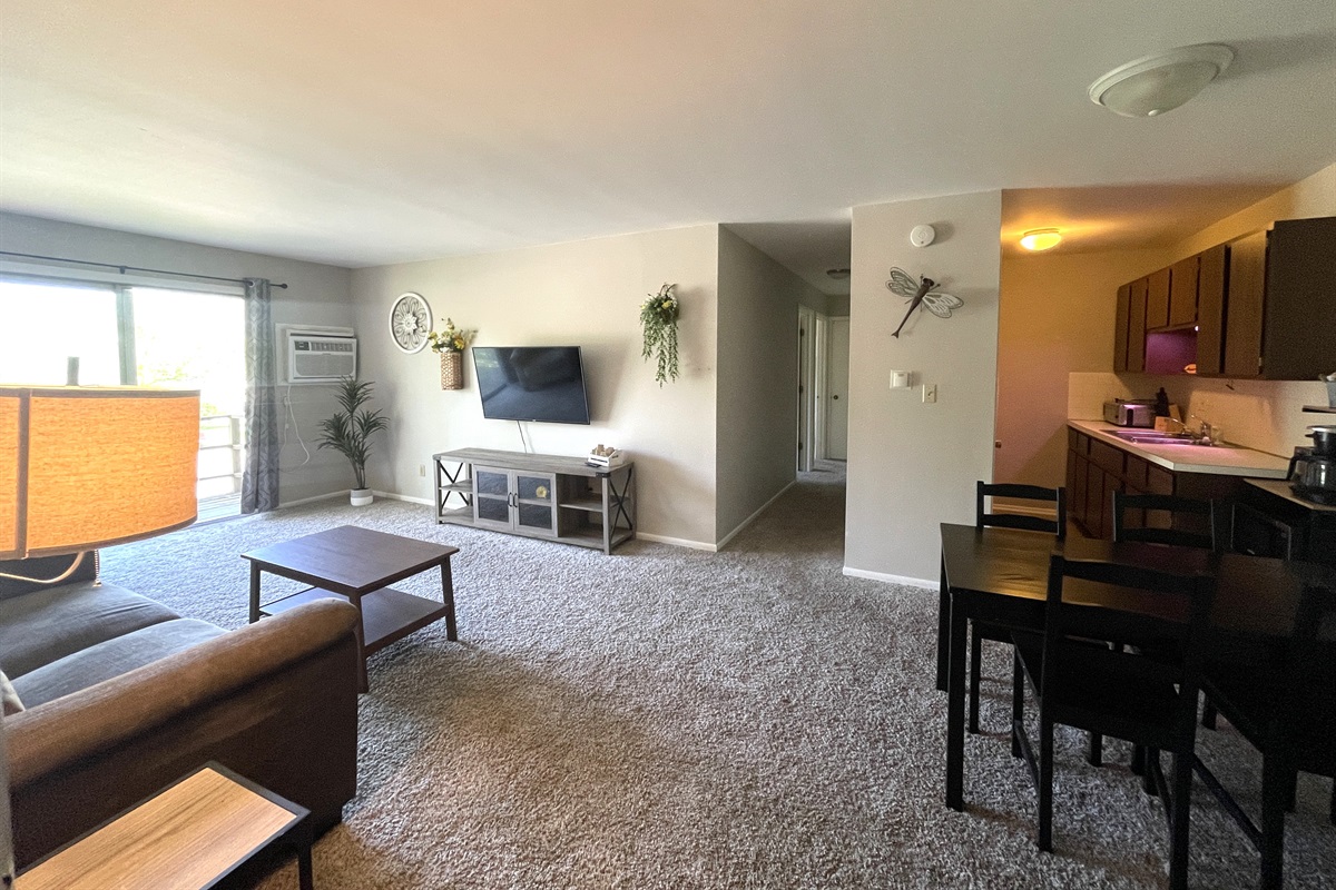 Open Concept Living Area with Dining and Full Kitchen