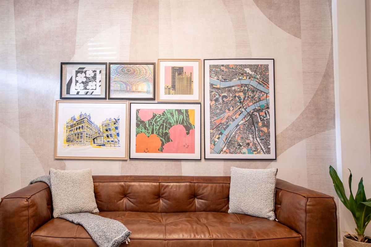 Spacious Couch with Wall Decor