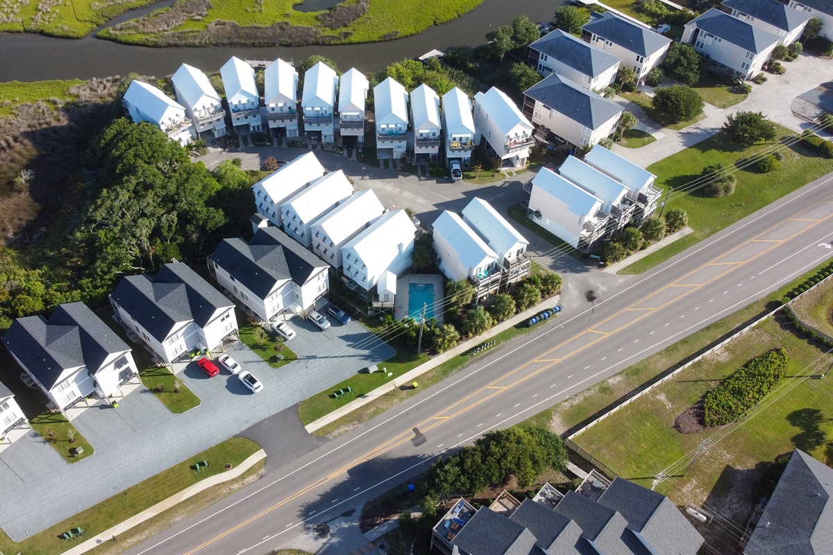 The sun-drenched streets of New River Dr and Mandalay Ct