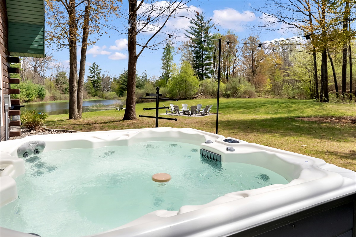 View from the hot tub on the side of the home overlooking the water.