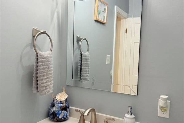 Ensuite bathroom with double towels and neutral tones — clean, simple, and calming. 