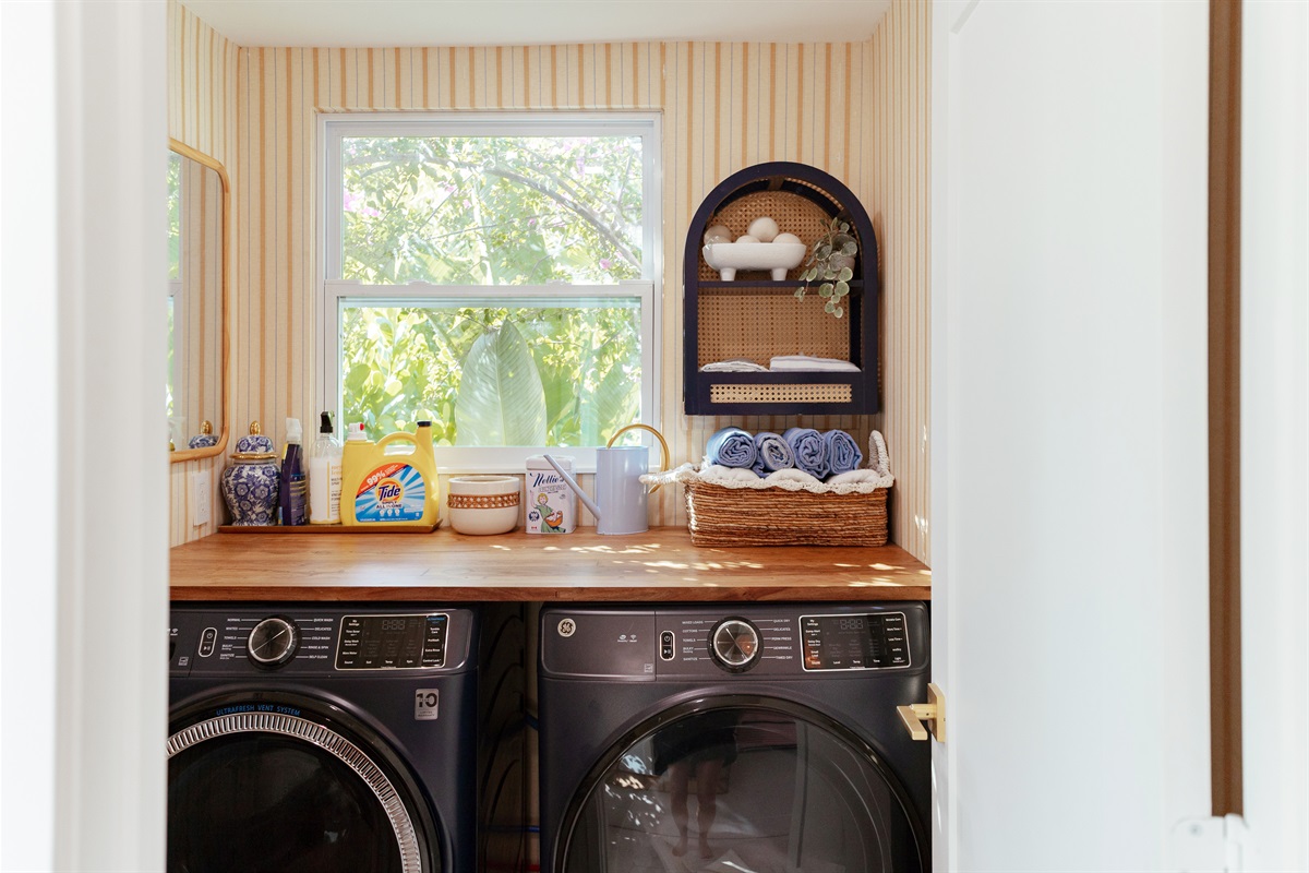 Next to the bathroom and kitchen in the main house, you'll find the laundry room.