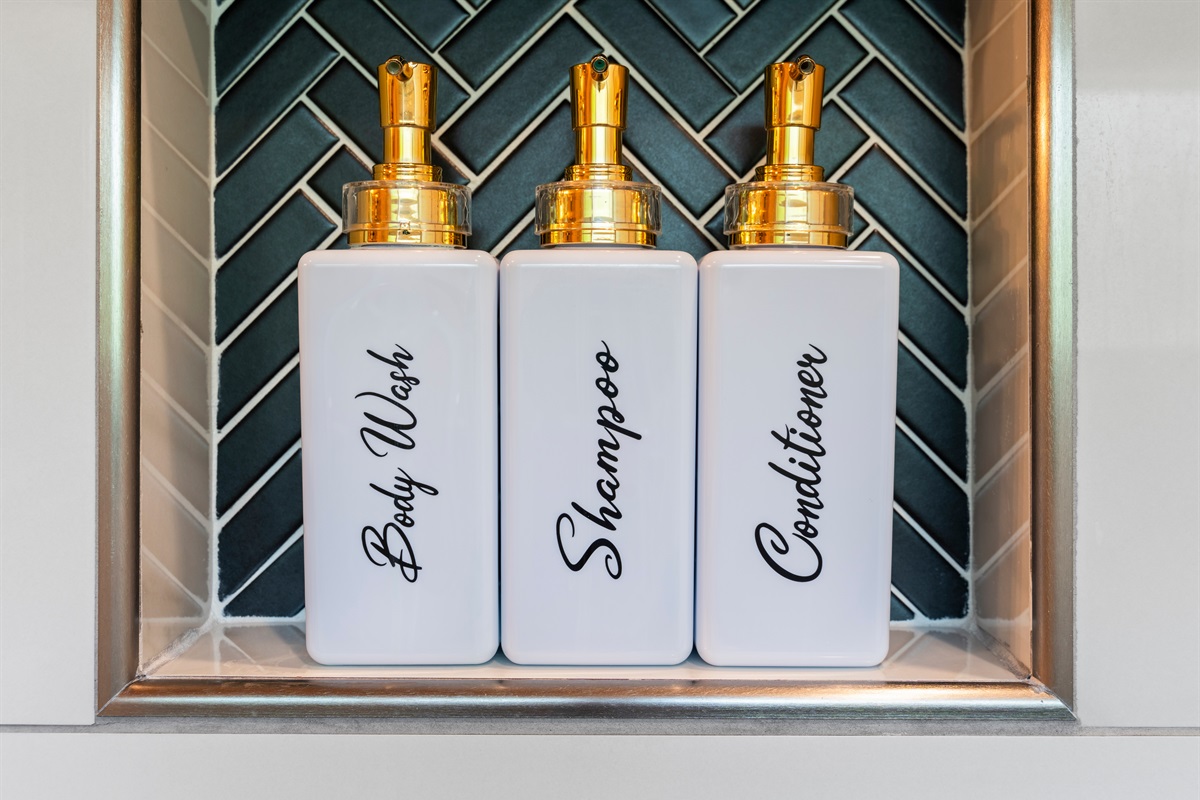 Thoughtfully stocked with luxe essentials: body wash, shampoo, and conditioner. Feel cared for with every detail.