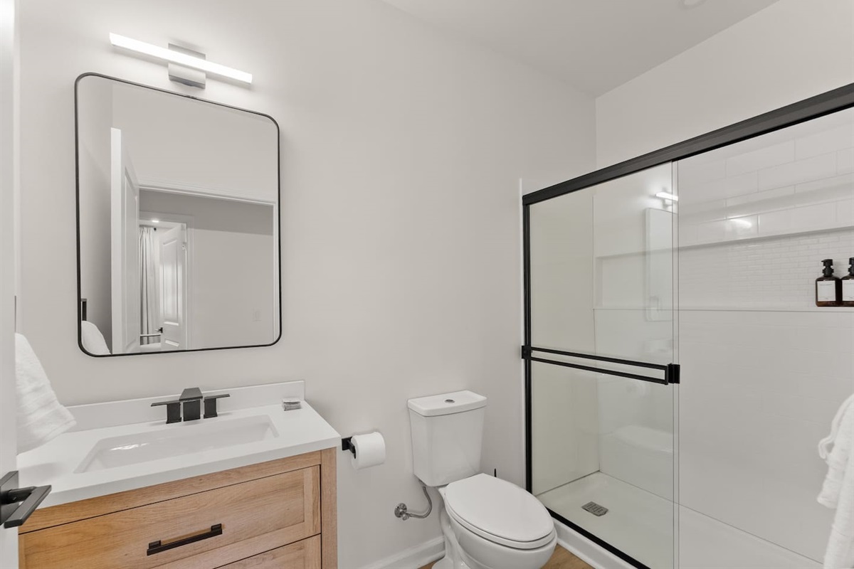 wo private full bathrooms located next to each other—convenient for families or groups.