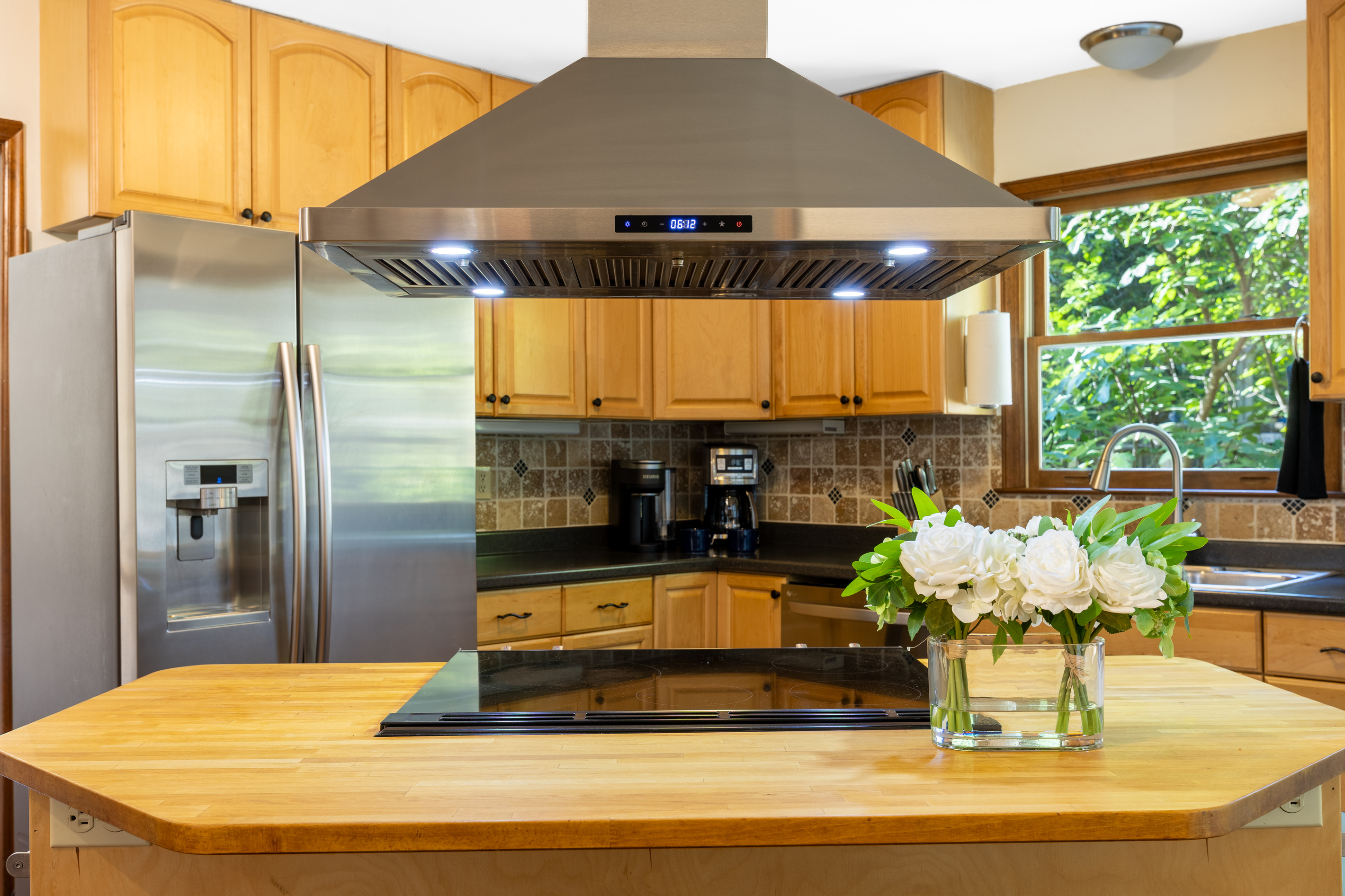 The kitchen is fully equipped with all major appliances.