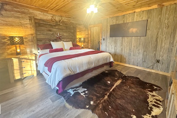 Handcrafted barnwood bed, hotel-quality linens, modern USB charging,