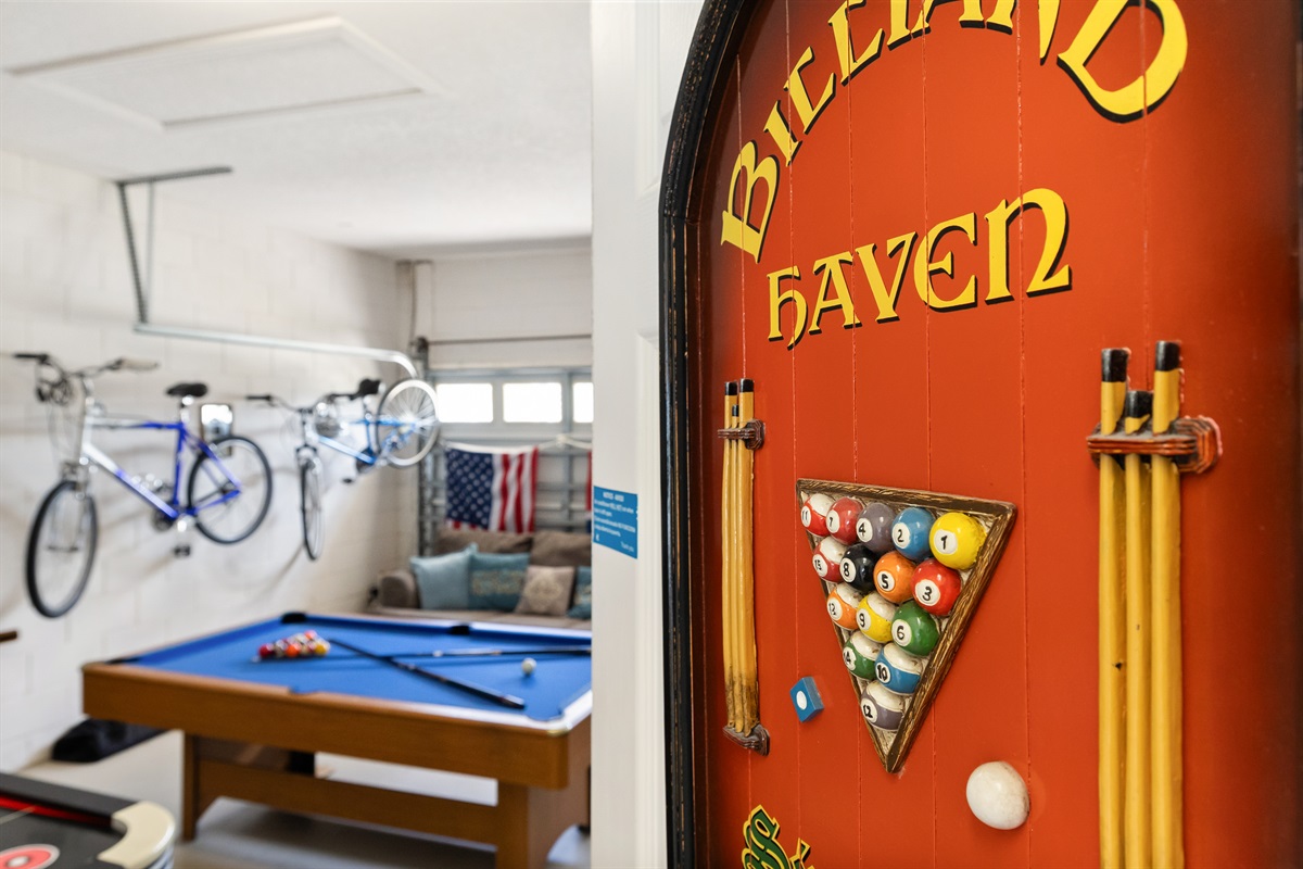 The entrance to the game room is through the laundry area.