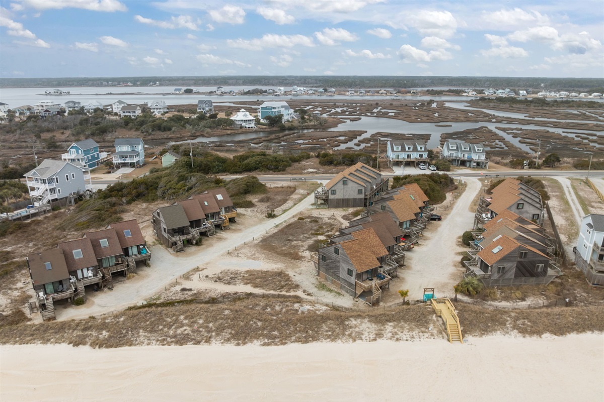 Aerial view of the beachside cottages just steps from the shore