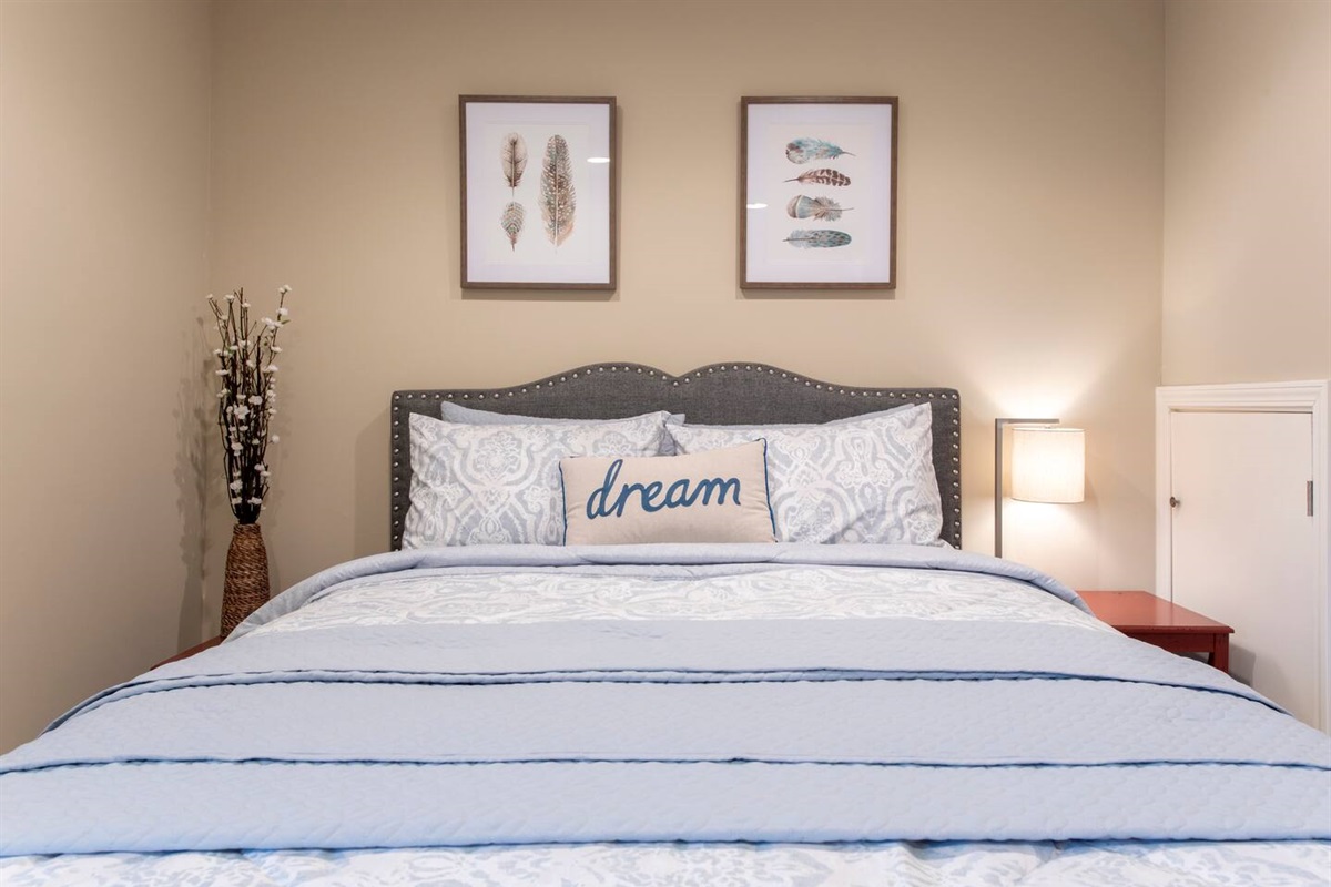 Relax and peacefully slumber in this queen sized bed.