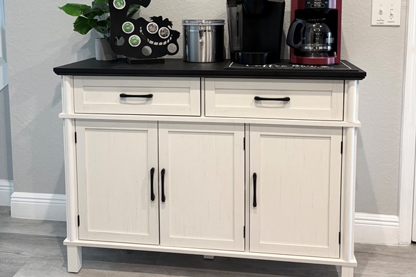Good morning! Coffee, tea, & hot cocoa station w/Disney mugs in kitchen.