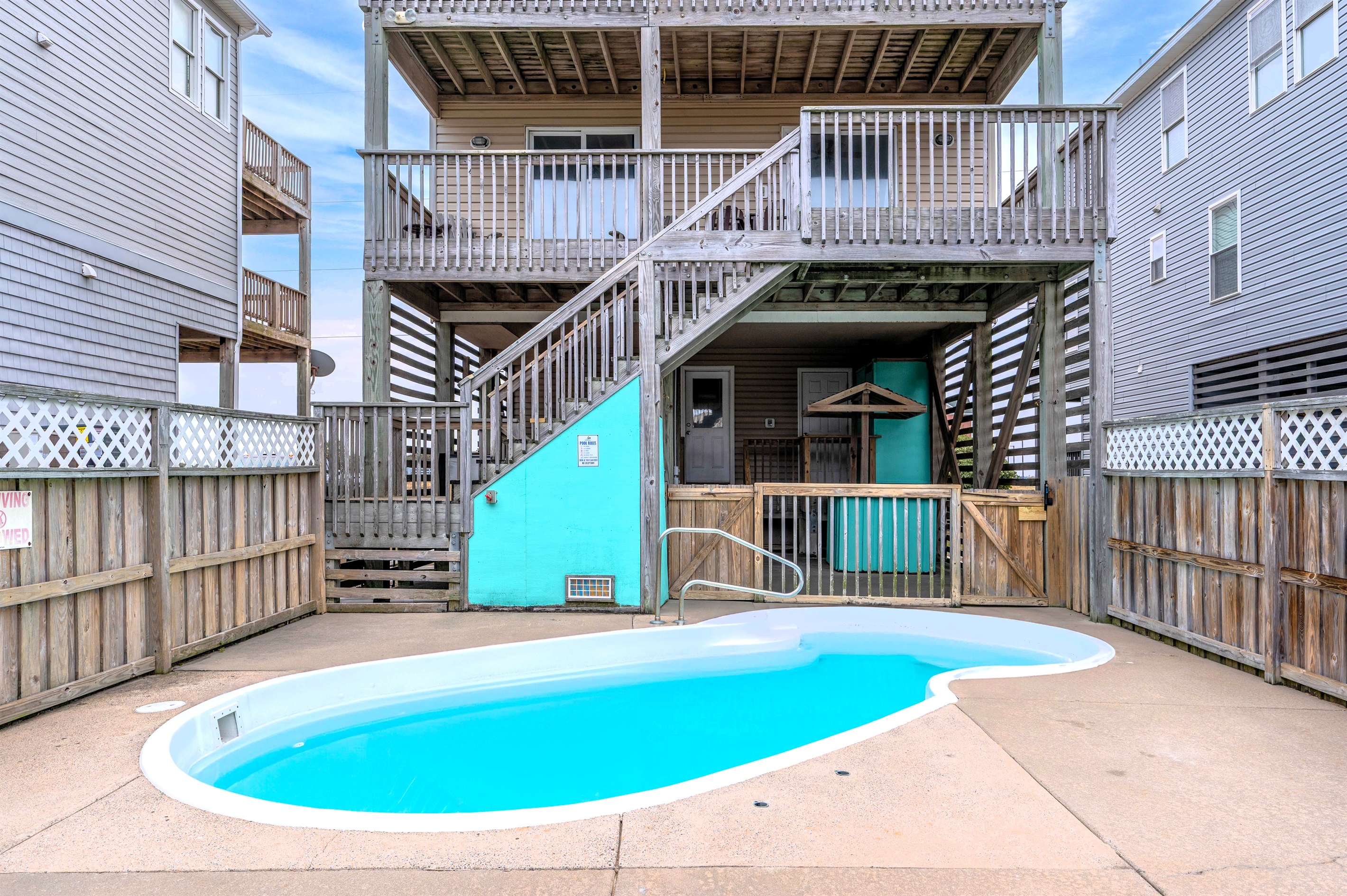 Relax by the poolside and soak up the sunshine.