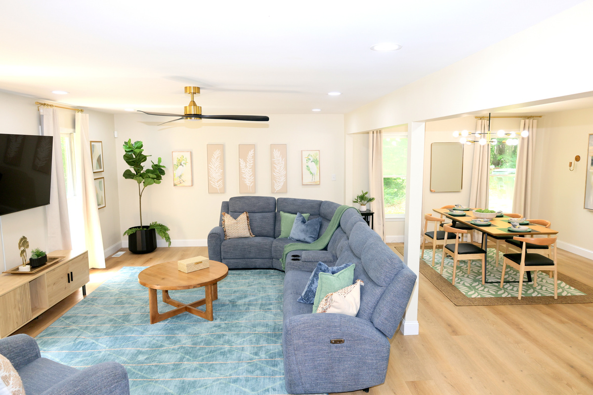 Spacious open living and dining area with stylish décor and plenty of room to gather