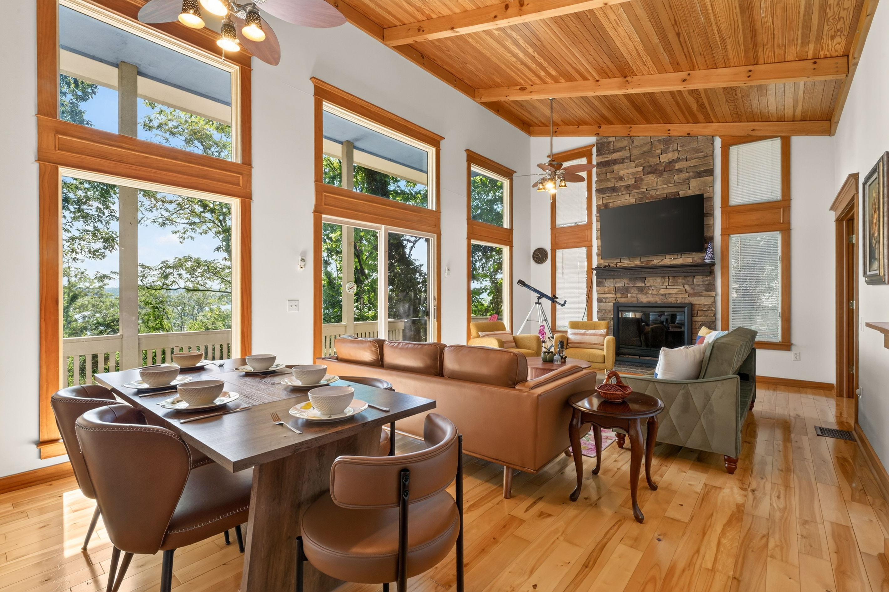 Dining table beside large windows