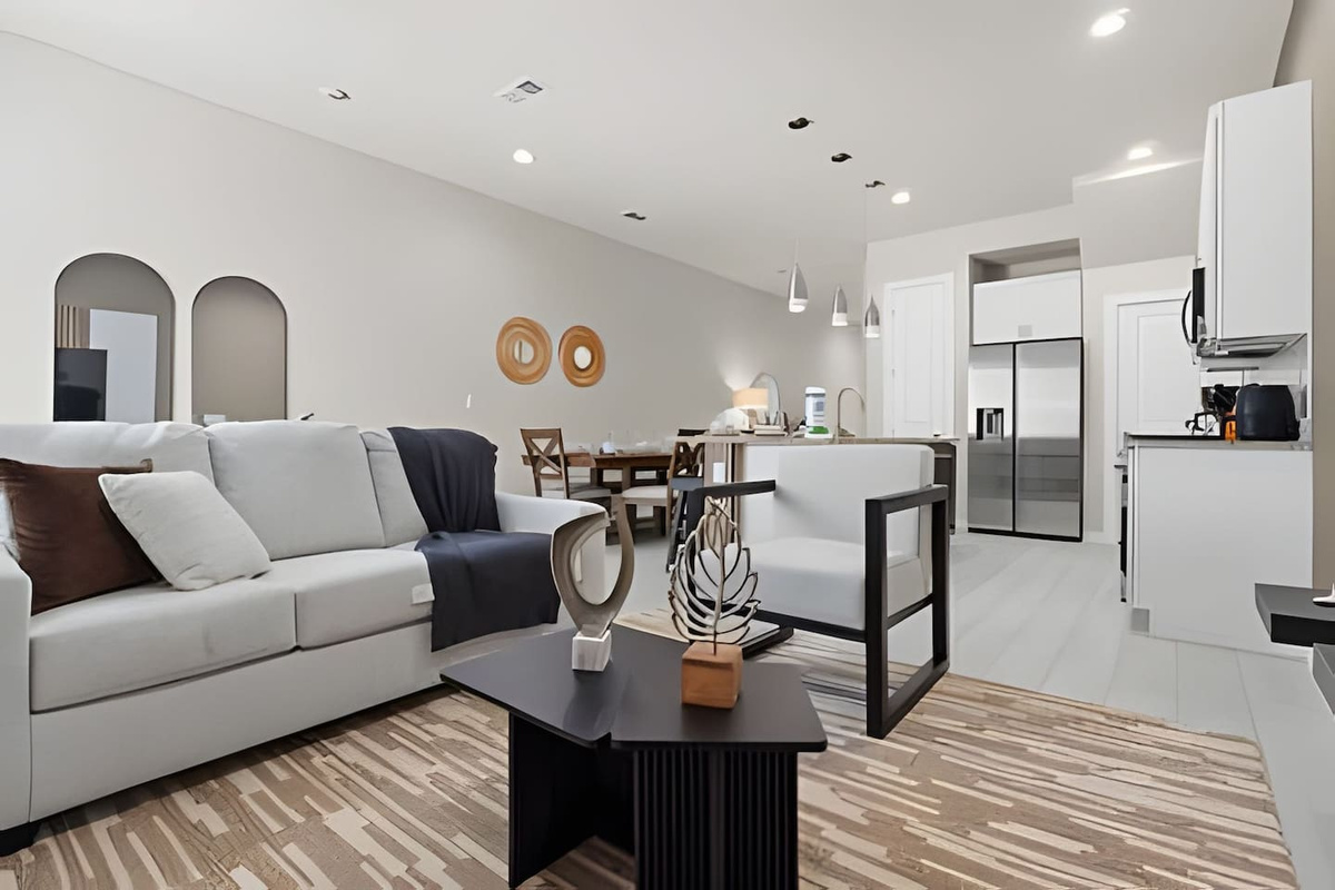 Perfect for relaxation, this open-concept living area blends comfort and contemporary design.