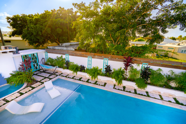 You belong in the chaise lounges relaxing by the pool in Dorado, Puerto Rico.