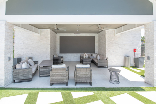 Shaded space with seating by the pool